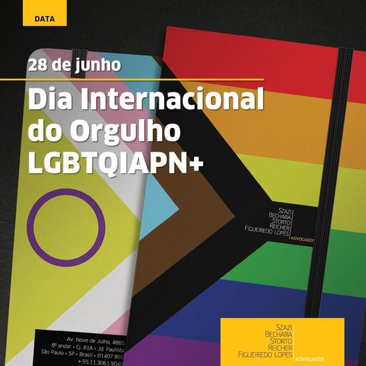 Foto de frente e verso do caderno de SBSA que traz a bandeira do orgulho LGBTQIAPN+
